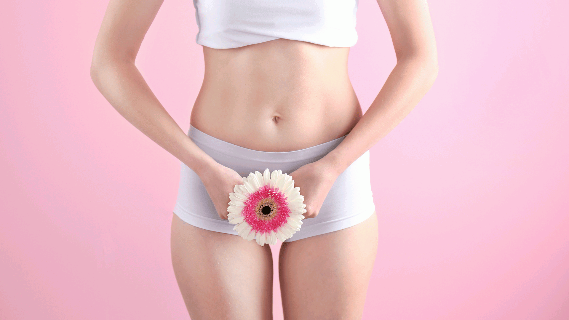 a woman holding a flower